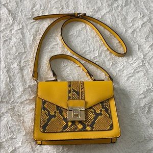 Yellow snake print purse